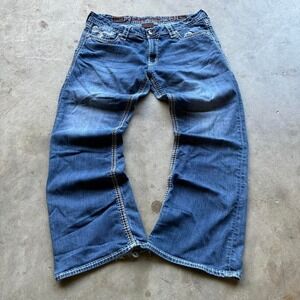 Bootcut rock revival grail jeans good fade and great back design